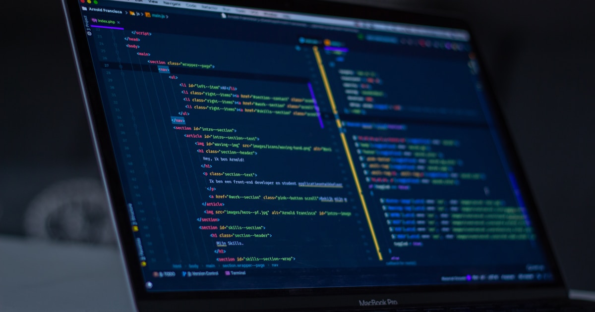 Developer coding with AI assistant on multiple screens - Tools Stack AI