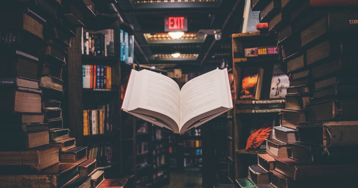 Stack of books and writing setup